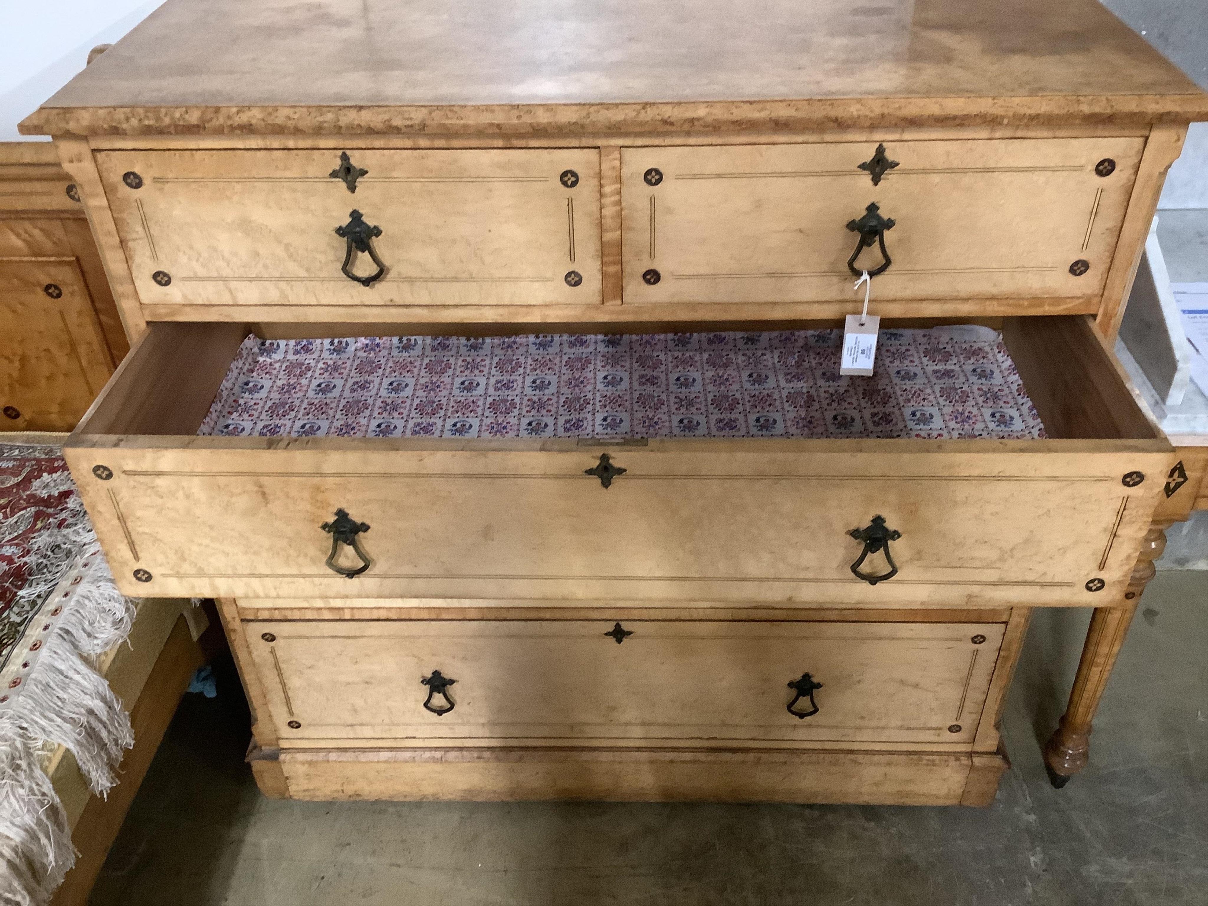 A late Victorian Gothic revival ebony inlaid, bird's eye maple bedroom suite, manner of Charles Bevan, comprising 5ft bed frame, kneehole dressing table, chest of drawers, marble top washstand, bedside cabinet, commode a